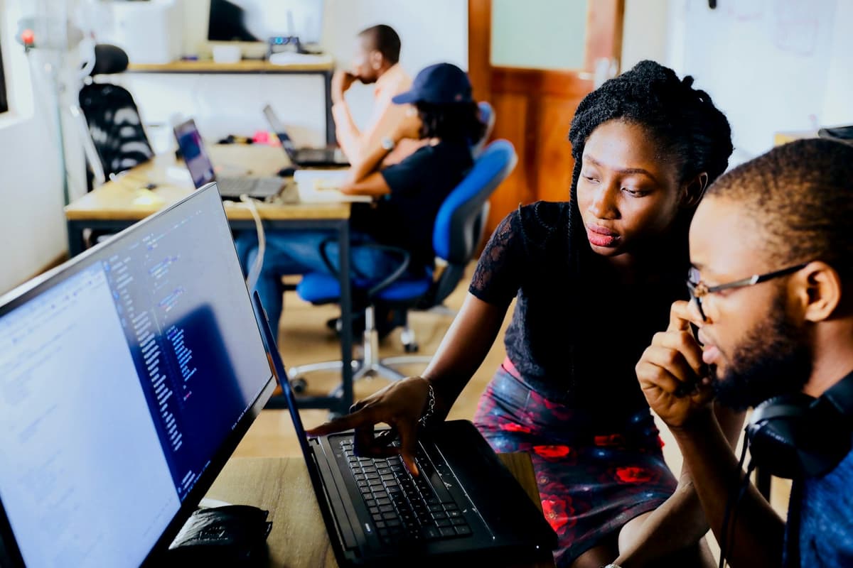 Engineers reviewing code together