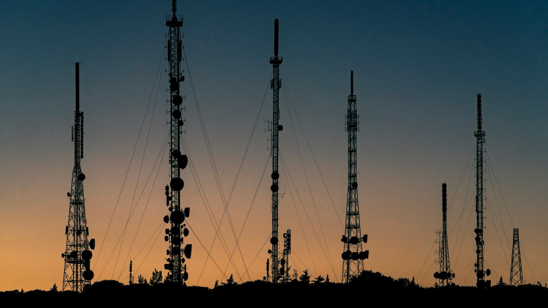 Telecommunication towers at dusk